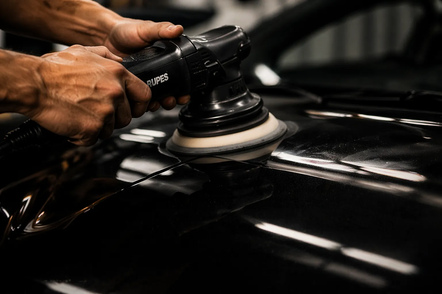 Paint correction and ceramic coating that restored gloss and made maintenance dramatically easier.